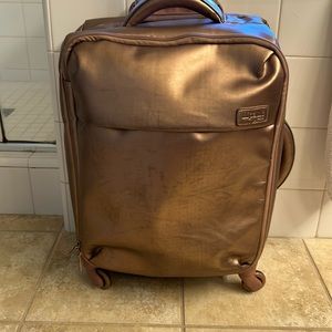 Lipault Paris Rose Gold Plume Cabin Spinner. 1’6” tall x 1’2” width x 8 “